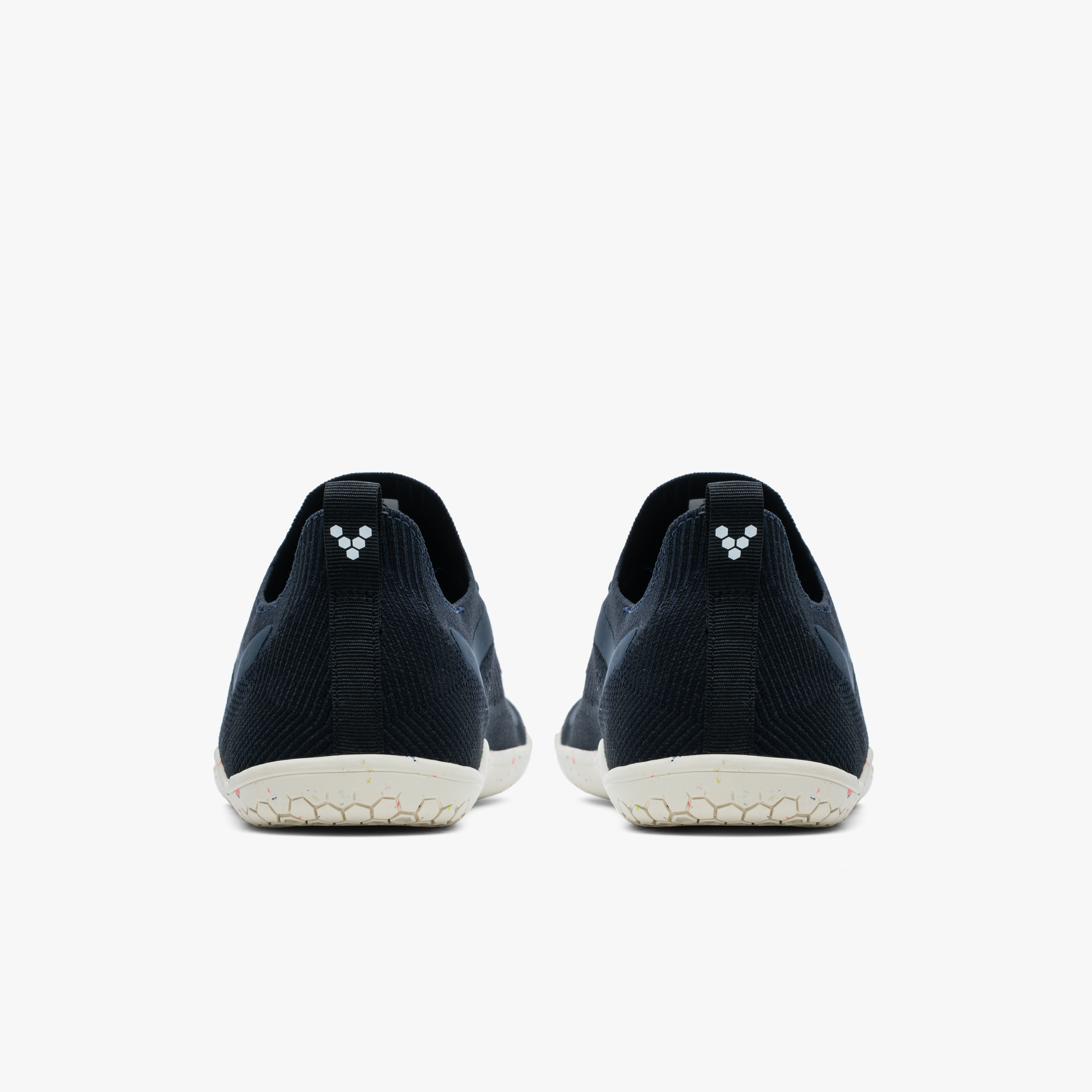 Bagfra visning af Vivobarefoot Primus Lite Knit Womens sko i mørkeblå, fremstillet af genanvendte materialer, med tynde, fleksible såler for en naturlig fodfornemmelse