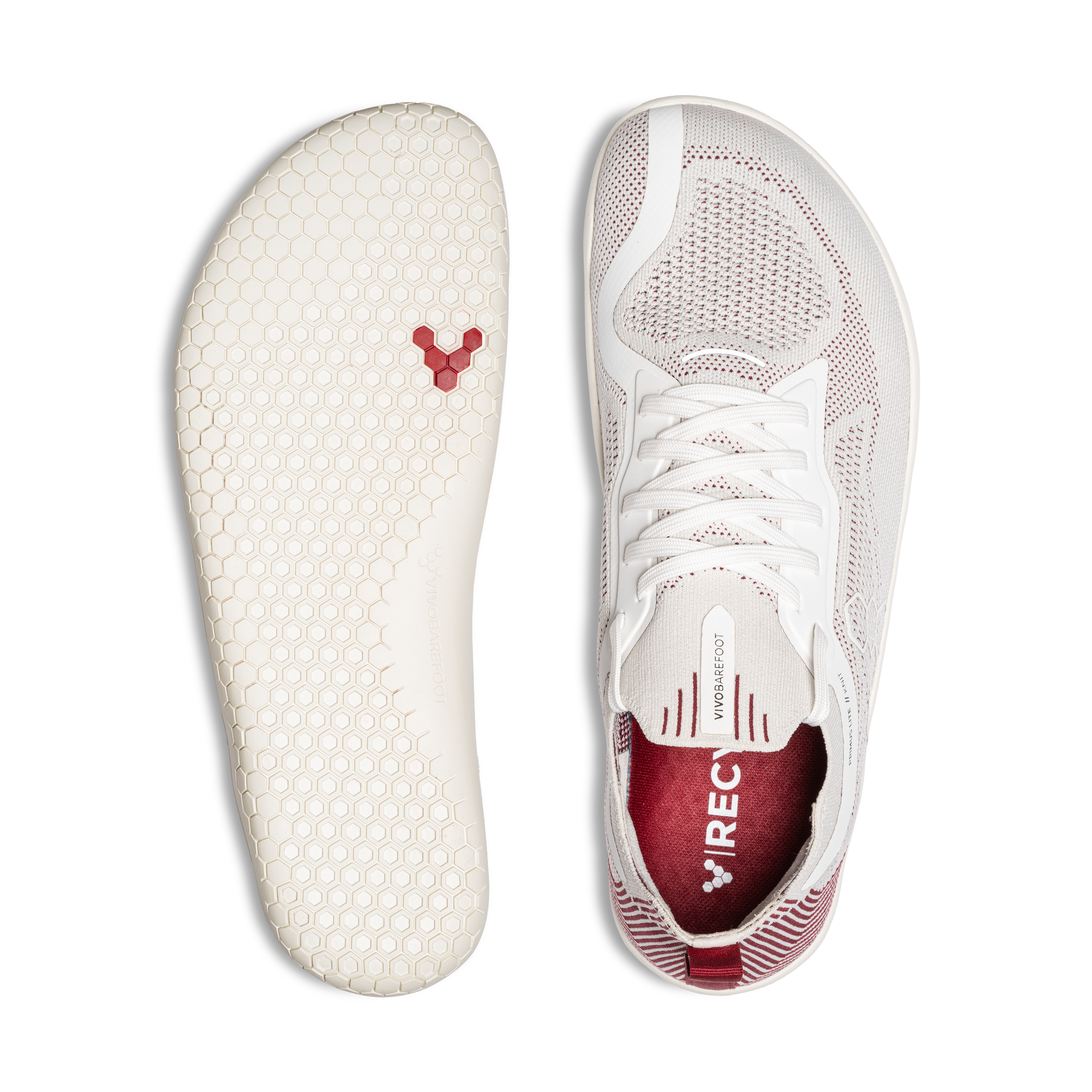 Vivobarefoot Primus Lite Knit barfodssko til kvinder i Off White / Burgundy, viser top og sål-design. Skoen fremhæver fodfrihed og miljøvenlige materialer.