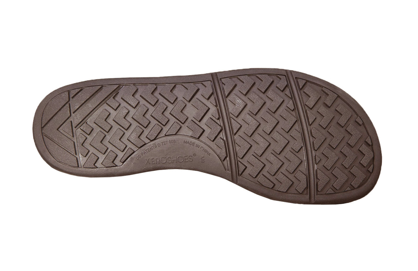 Brun Xero Shoes Denver minimalistisk barfodssko-sål med slidstærkt FeelTrue gummi og geometrisk trækmønster for bedre greb.